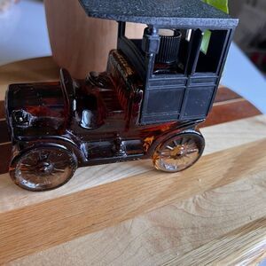 vintage Avon 1906 Reo Depot Wagon bottle.ambar color glass full